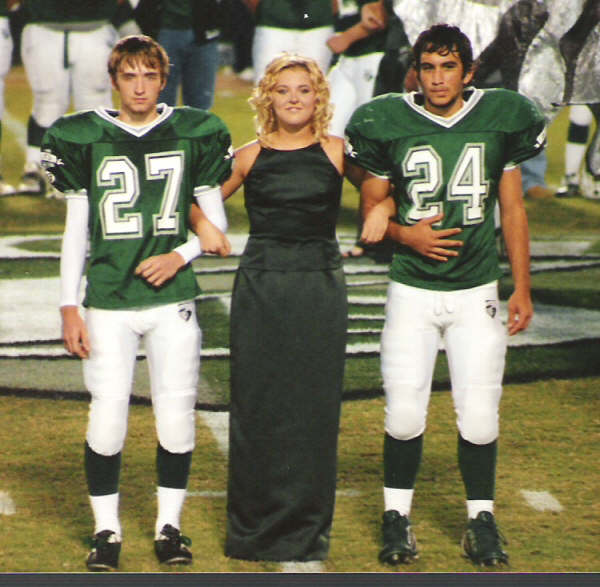 Two Greenbrier football escorts and a Homecoming court member in 2005