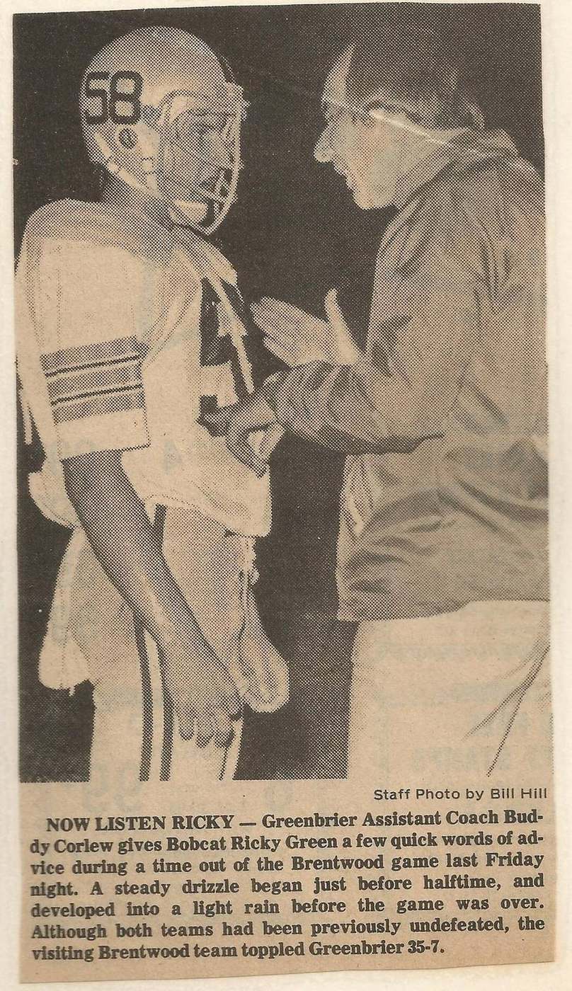 Assistant coach Buddy Corlew talks with Greenbrier player Ricky Green during the 1977 Brentwood Academy game