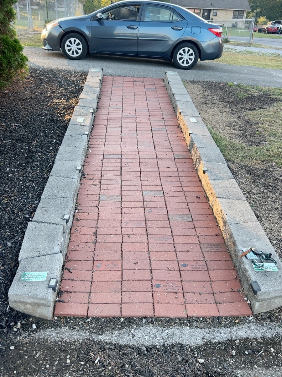 The existing commemorative brick walkway at Greenbrier